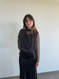 Haut à pois noir